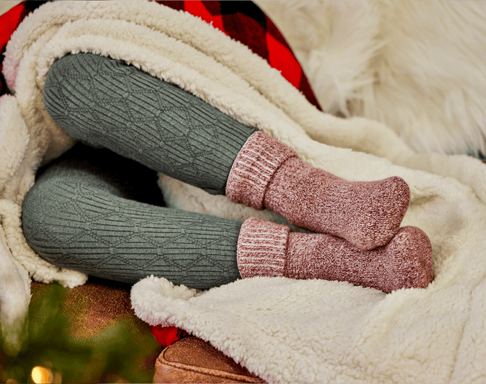 Child wearing Ten Little Cozy Socks - Rust. Available at www.tenlittle.com