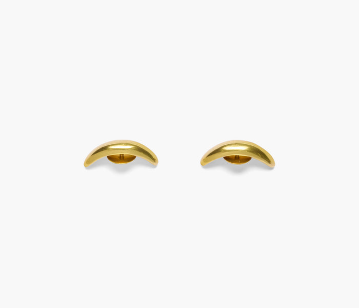Gold Crescent Loafer Charm from Luis Mora, a stylish accessory featuring a sleek crescent design for shoe embellishment.