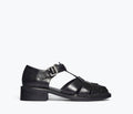 Black Dahlia T-strap fisherman loafer by FREDA SALVADOR, front view showing sleek design and T-strap details.