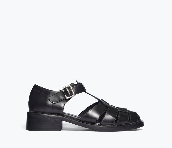 Black Dahlia T-strap fisherman loafer by FREDA SALVADOR, front view showing sleek design and T-strap details.