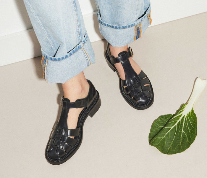 Black Dahlia T-strap fisherman loafer by Freda Salvador with sleek design and classic silhouette.