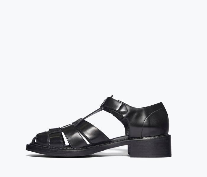 Black Dahlia T-strap fisherman loafer by Freda Salvador, showing the inside view with stylish design and comfortable interior.
