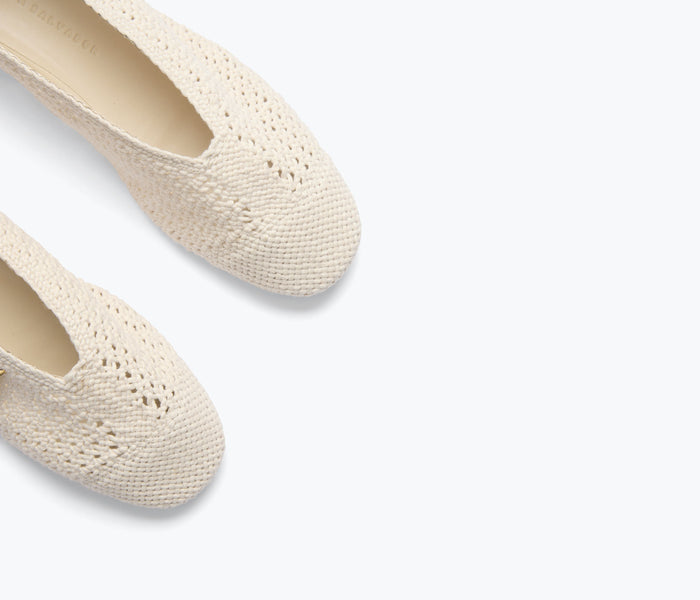Freda Salvador Daisy Crochet Flat in vanilla with detailed crochet pattern and sleek flat design for casual or chic outfits.