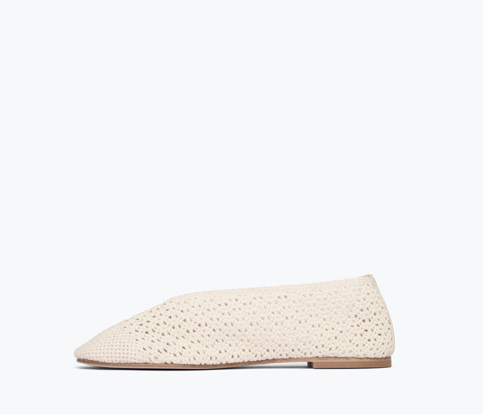 Inside view of Freda Salvador Daisy Crochet Flat in vanilla, showing detailed crochet craftsmanship and interior lining.