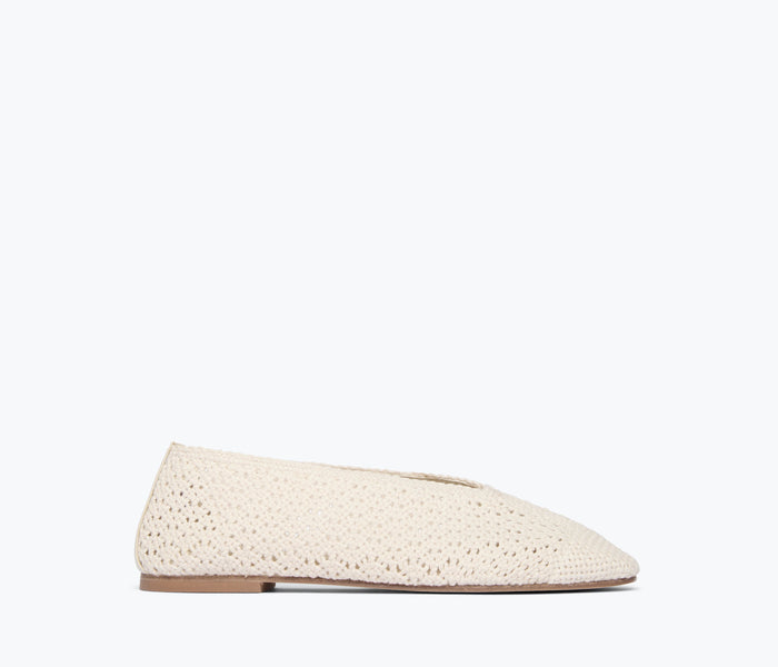 Freda Salvador Daisy Crochet Flat in vanilla color, front view showing detailed crochet pattern and sleek flat design.
