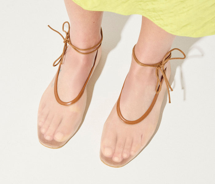 Fredas Salvador Daisy Mesh Flat showing a pointed toe design with stone embellishments and mesh upper for a stylish, casual look.