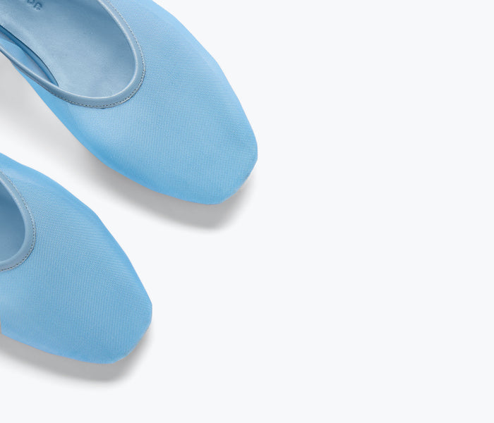 Freda Salvador Daisy Mesh Flat showing denim and mesh design with pointed toe and sleek silhouette.