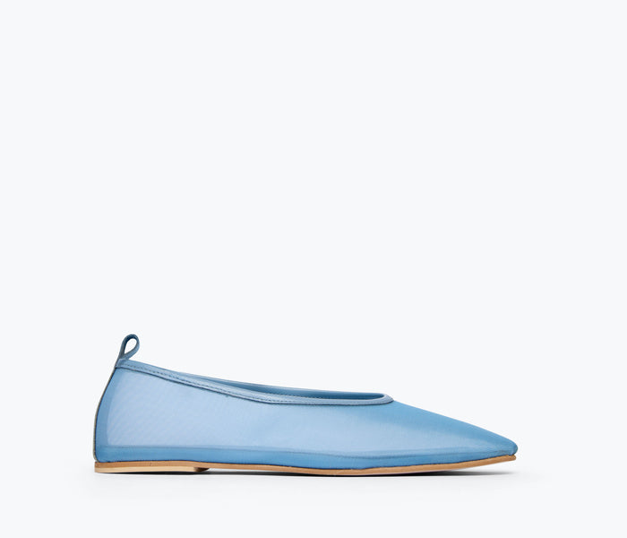 Fredas Salvador Daisy Mesh Flat shoe in denim with mesh uppers, front view showing sleek, minimalist design and no laces.
