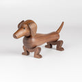 Danish wood dog figurine or sculpture designed by Kay Bojesen in 1934 and made in oiled walnut.