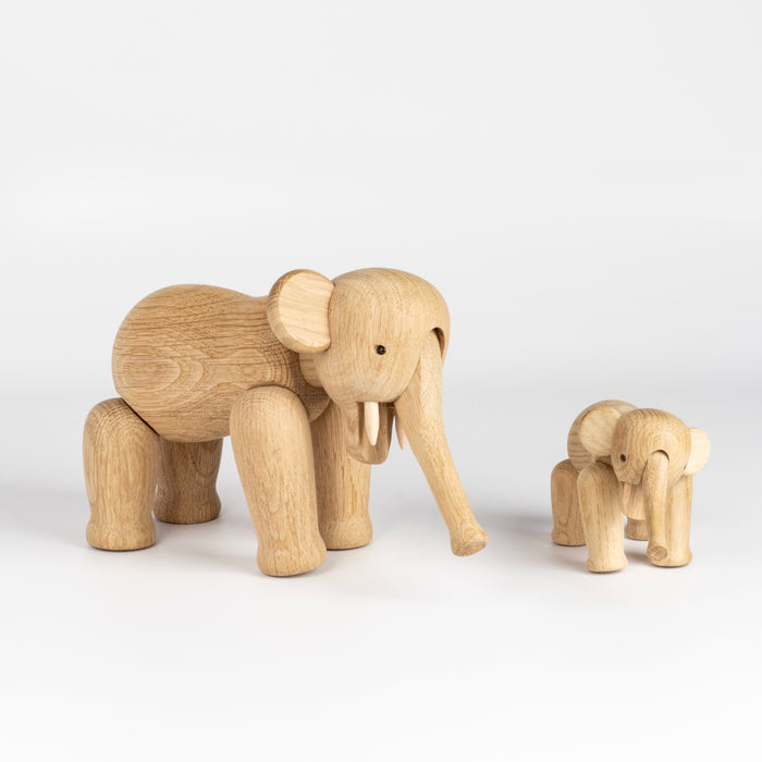 Small and Lilliput elephant in oak wood by Kay Bojesen.