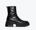 Freda Salvador Darla black Chelsea boot with lug sole, front view showing sleek leather design and sturdy outsole.