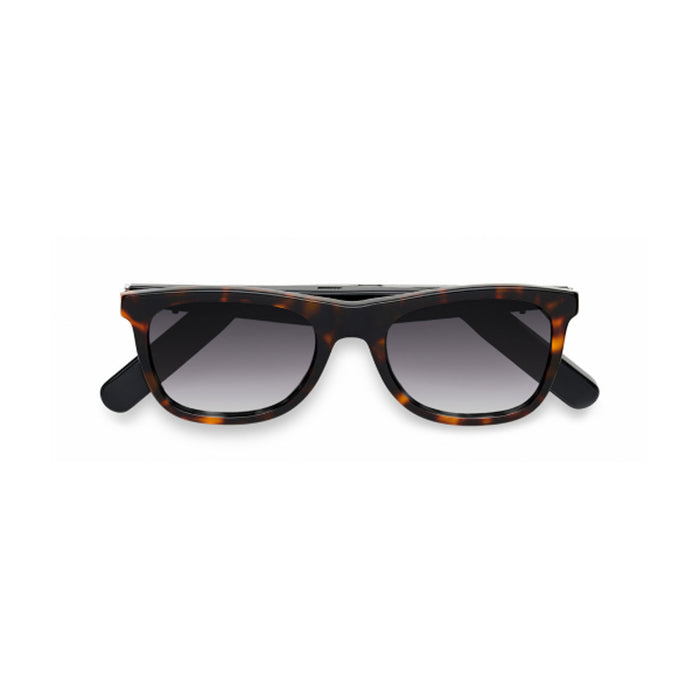 The Nautica Dockside sunglasses feature a tortoiseshell pattern, dark rectangular polarized UV400 lenses, and black arms, displayed on a white background.