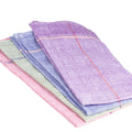 Dosa assorted color napkins are designed by Christina Kim for Lulu Restaurant at the Hammer Museum. Woven by a Khadi cotton cooperative in Rajsitapour, India, each set includes one napkin in each color and come in a paper bag with a Lulu sticker.