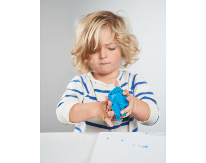 Child playing with Eco-kids Eco-dough. Available from tenlittle.com