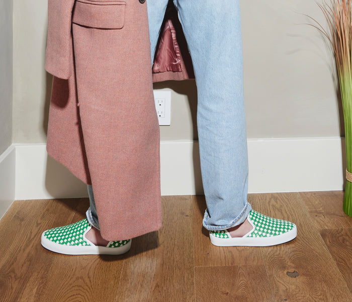 Green FREDA SALVADOR Eddy D'Orsay sneaker with a sleek design, featuring a low-cut silhouette and stylish laces.