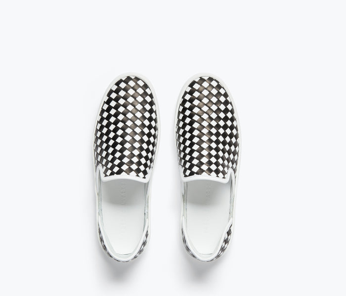 Black and white FREDA SALVADOR Eddy D'Orsay sneaker featuring a sleek design and stylish top view.