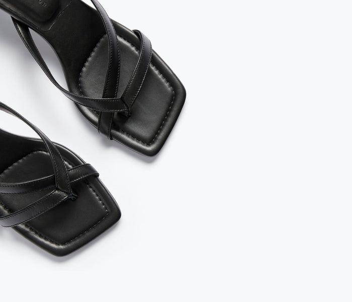 Black Nappa leather Elaine heel by Freda Salvador with a sleek design and pointed toe.
