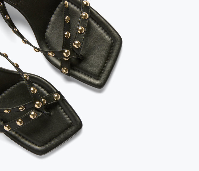 Black and gold detail on FREDA SALVADOR Elaine heel showcasing elegant design and stylish high-heeled footwear.