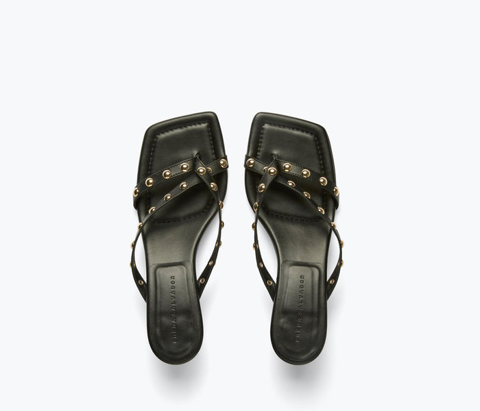 Black and gold FREDA SALVADOR Elaine heel with pointed toe and elegant design, shown from the top view.