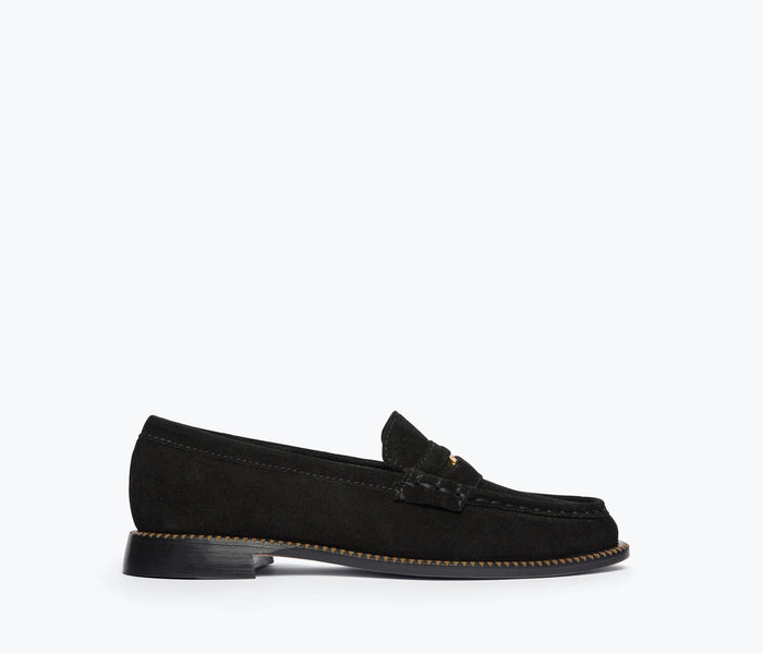 Freda Salvador Elba Penny Loafer in black suede, front view showcasing the classic slip-on design and sleek silhouette.