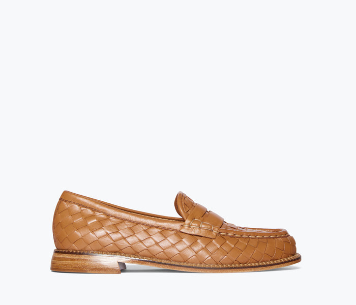 Freda Salvador Elba Penny Loafer in cognac with woven front, classic slip-on design, and stylish leather construction.