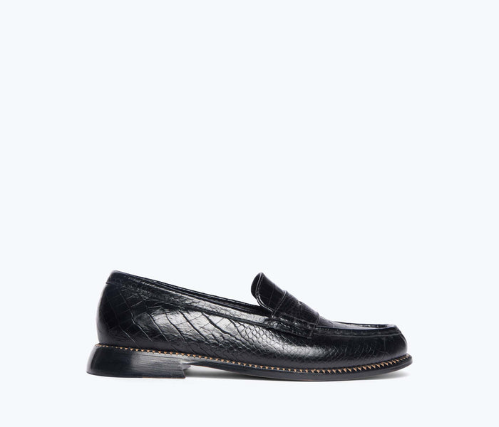 Black ELBA Penny Loafer by FREDA SALVADOR featuring a classic slip-on design with a croc-embossed leather finish.