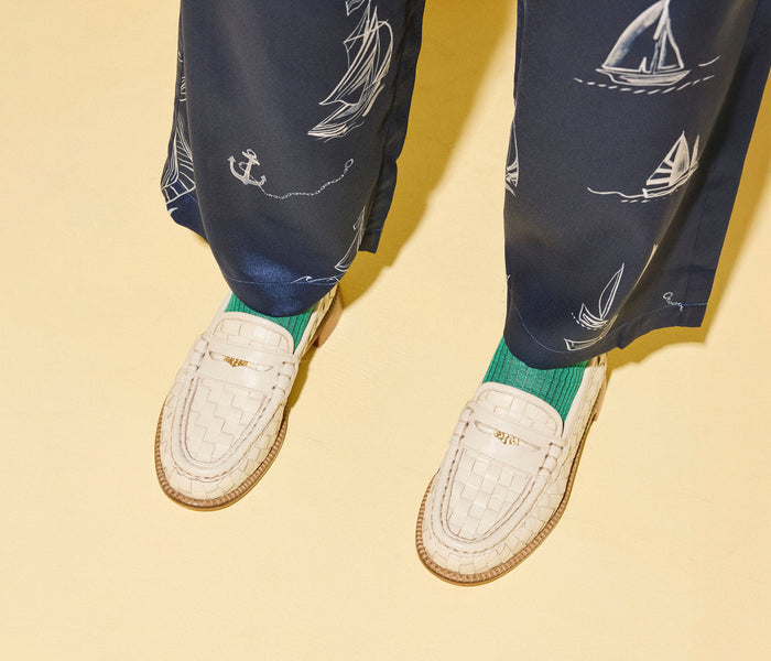 Freda Salvador Elba Penny Loafer in vanilla with woven detail, showcasing classic slip-on style and textured leather upper.