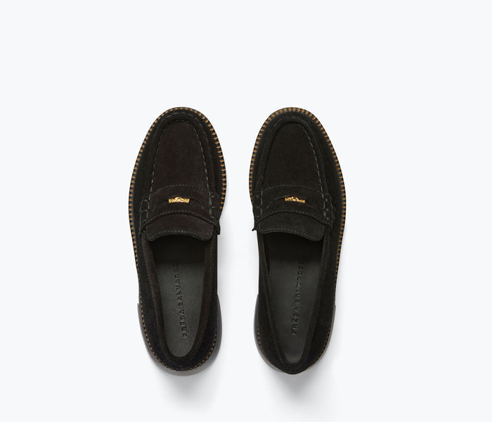 Black suede Freda Salvador Elba Penny Loafer with sleek top stitching and classic loafer design.