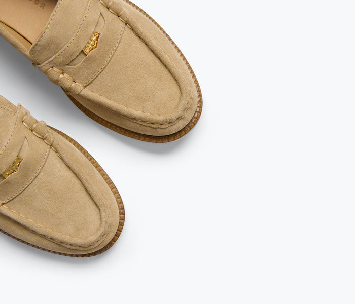 FREDA SALVADOR ELBA Penny Loafer in stucco suede with detailed stitching and classic loafer design.