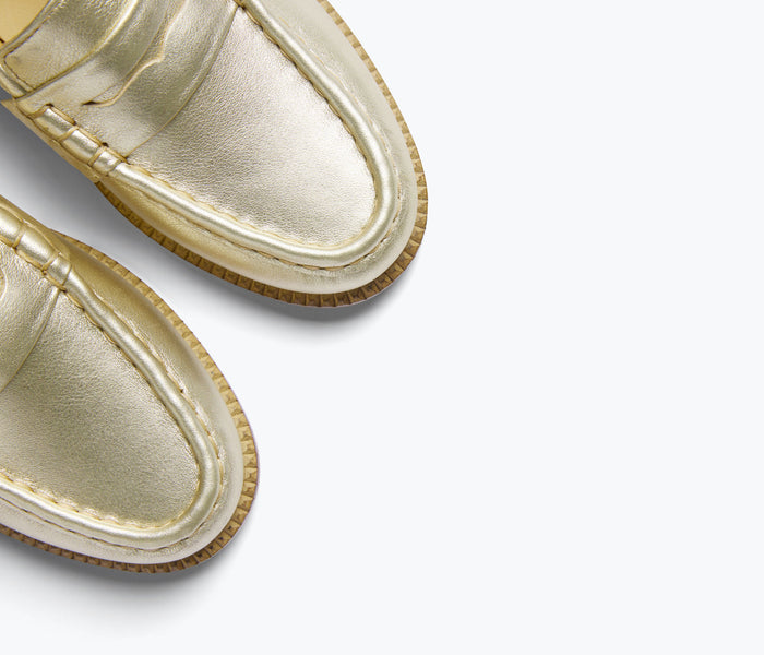 FREDA SALVADOR Elba Penny Loafer in gold with detailed stitching and classic loafer design, stylish footwear for women.