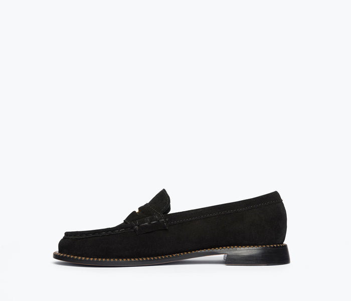Black suede Freda Salvador Elba Penny Loafer with classic slip-on design and comfortable interior.