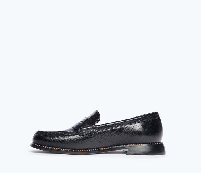 Freda Salvador Elba Penny Loafer in black croc leather, showing the inside view with detailed stitching and classic loafer style.