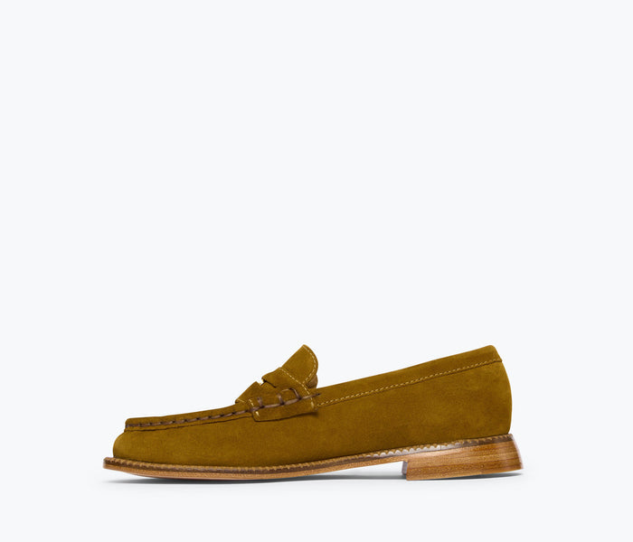 Fredda Salvador Elba Penny Loafer in suede, showing the inside view with classic loafer design and stitching details.