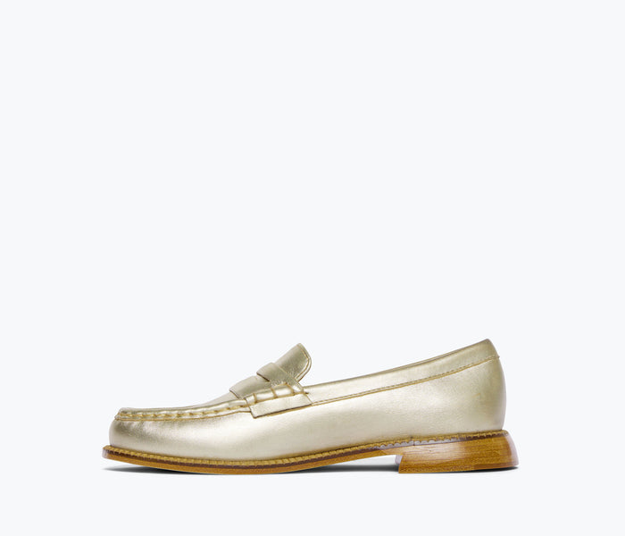 FREDA SALVADOR ELBA Penny Loafer in gold leather, showing the inside view with classic loafer design and stitching details.