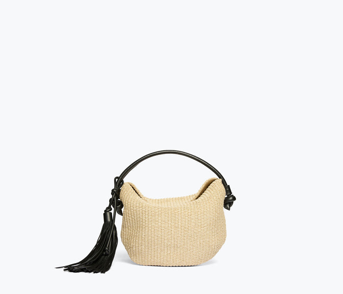 Freda Salvador Elis Mini Crescent Bag in natural raffia with sleek design and compact shape, featuring a front view.