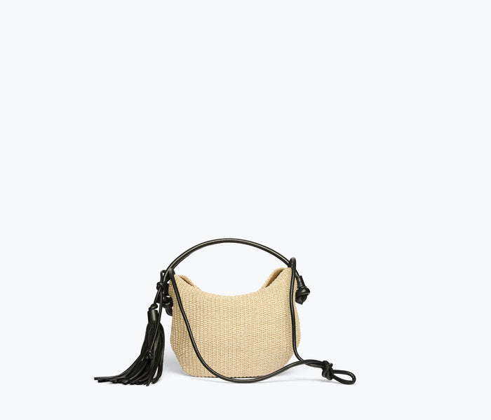 Freda Salvador Elis Mini Crescent Bag made of natural raffia with a slim strap, small compact design, perfect for casual outings.