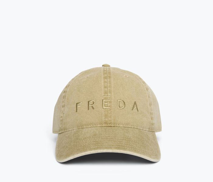 Khaki embroidered Freda hat by OTTO, stylish apparel accessory with detailed front embroidery and adjustable brim.