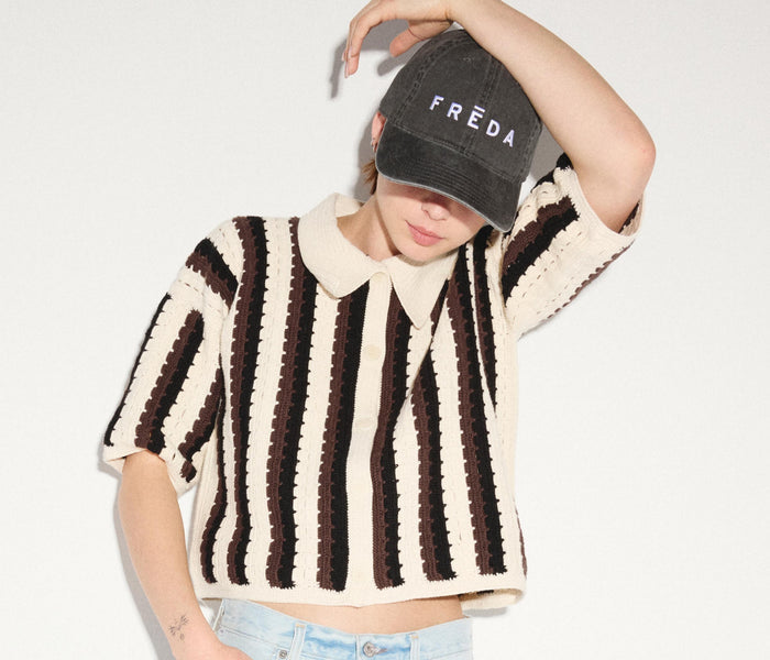 Black embroidered Freda hat from OTTO, stylish apparel accessory with detailed embroidery and comfortable fit.