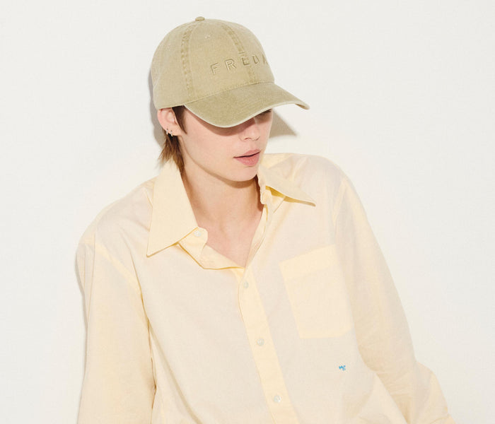 Khaki embroidered Freda hat by OTTO featuring detailed stitching and a casual, stylish design for everyday wear.