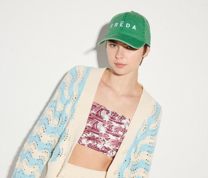 Green embroidered Freda hat by OTTOCAP, stylish accessories with detailed stitching and casual fit.