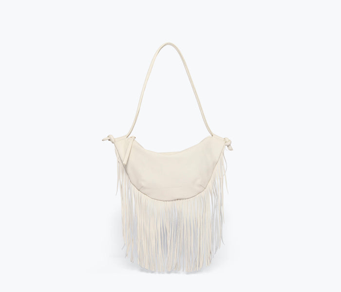 Freda Salvador Erika Crescent Fringe Bag in bone calf leather with fringe detailing, shown from the front view.