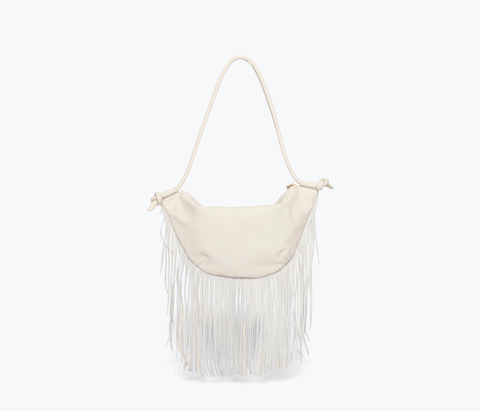 Freda Salvador Erika Crescent Fringe Bag in bone calf leather with crescent shape and fringe details, viewed from back.