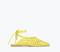 Yellow woven calf strap ETTA ankle lace-up mule by Freda Salvador with front view and flat sole.