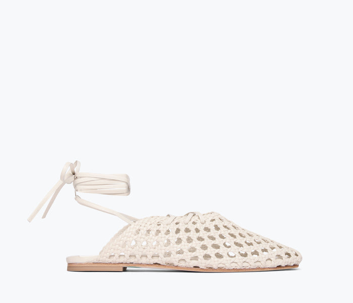 Freda Salvador ETTA woven ankle lace-up flats with calf straps, featuring a sleek mule design in a natural woven fabric.