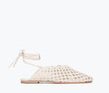 Freda Salvador ETTA woven ankle lace-up flats with calf straps, featuring a sleek mule design in a natural woven fabric.