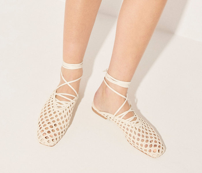 Freda Salvador ETTA woven ankle lace-up flat mule in vanilla color with woven textured design and ankle laces.