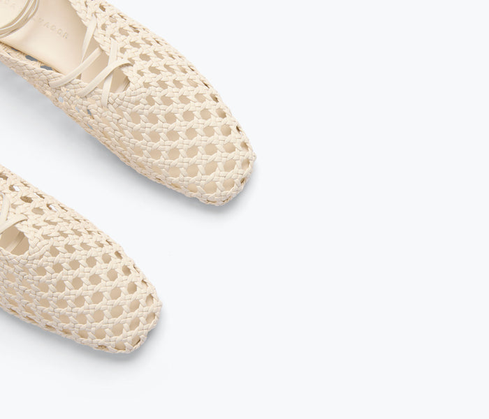 Freda Salvador ETTA woven ankle lace-up mule with calf strap and flat sole, featuring a woven design in a vanilla color.