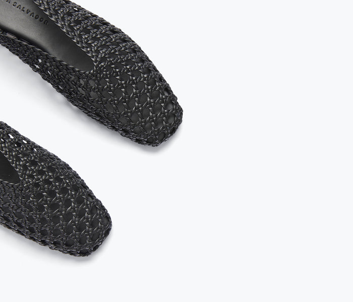 Black woven calf leather ETTA ankle lace-up mule by Freda Salvador, showing detailed woven texture and sleek flat design.