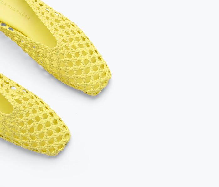 Fredas Salvador Etta woven yellow ankle lace-up flat mule with detailed woven calf material and closed toe design.