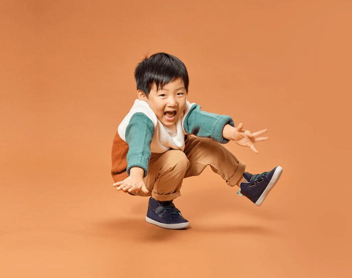 Child wearing Ten Little Everyday High Tops - True Navy. Available at www.tenlittle.com
